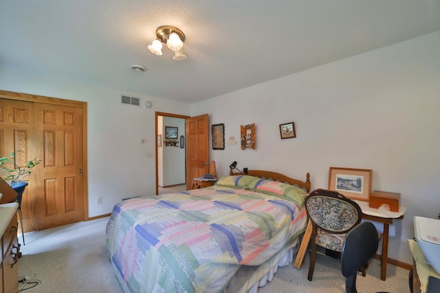 909 Lilac Ln, Little Falls, MN 56345 - bedroom with light carpet and baseboards