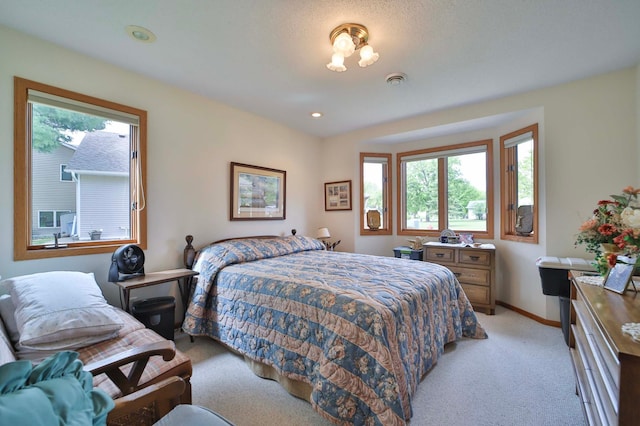 909 Lilac Ln, Little Falls, MN 56345 - bedroom featuring light carpet and baseboards