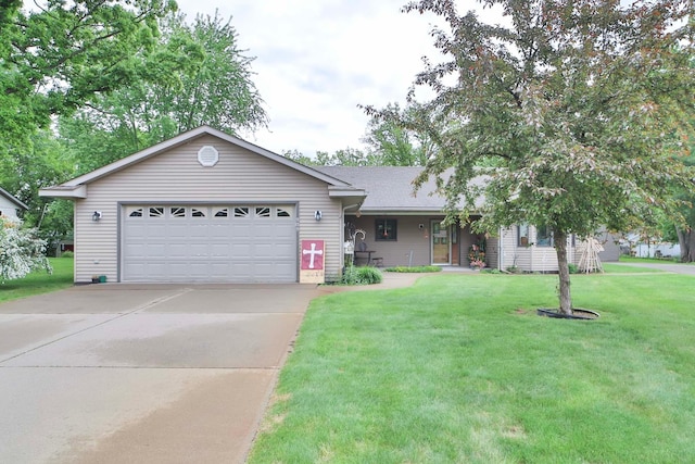 909 Lilac Ln, Little Falls, MN 56345 - ranch-style home featuring a front yard, a garage, and concrete driveway