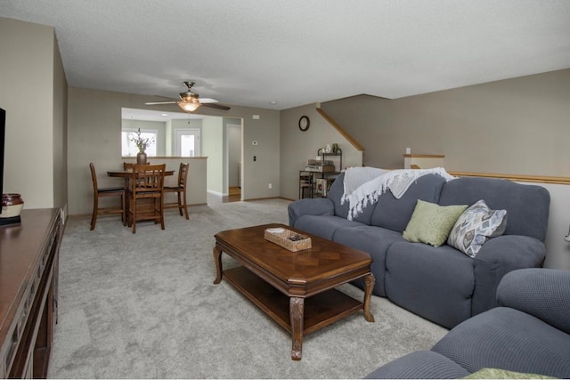 5150 Fairpoint Dr N, Hugo, MN 55038 - living room featuring ceiling fan and light colored carpet
