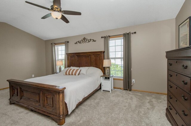 5150 Fairpoint Dr N, Hugo, MN 55038 - bedroom featuring lofted ceiling, light carpet, baseboards, and ceiling fan