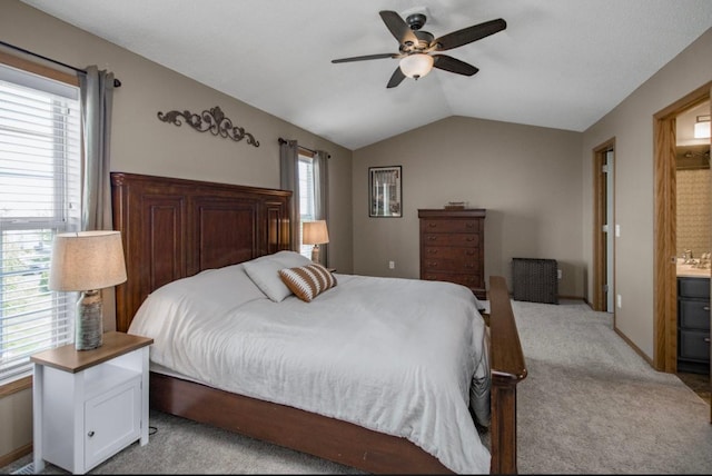 5150 Fairpoint Dr N, Hugo, MN 55038 - bedroom with carpet floors, lofted ceiling, connected bathroom, and ceiling fan