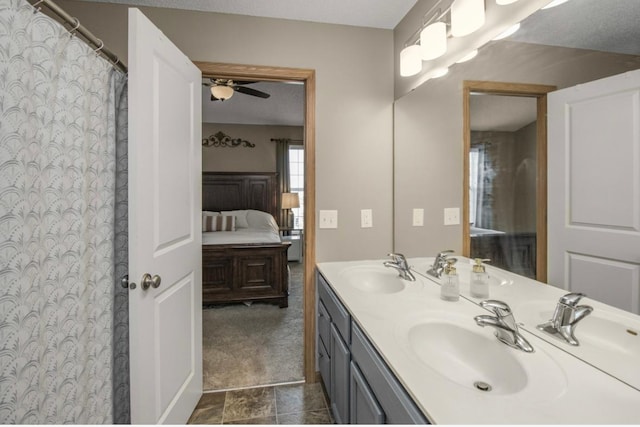 5150 Fairpoint Dr N, Hugo, MN 55038 - ensuite bathroom with double vanity and ceiling fan