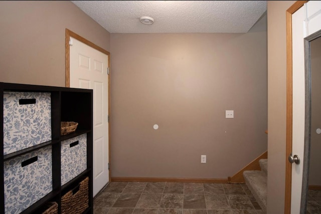 5150 Fairpoint Dr N, Hugo, MN 55038 - unfurnished bedroom with a textured ceiling and baseboards