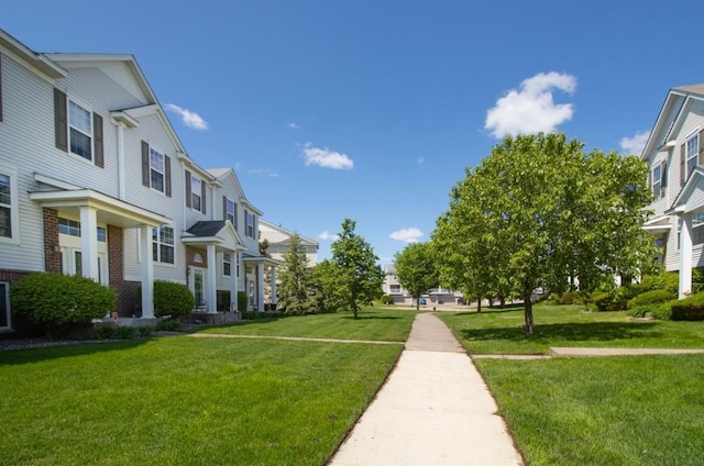 5150 Fairpoint Dr N, Hugo, MN 55038 - view of property's community with a residential view and a lawn