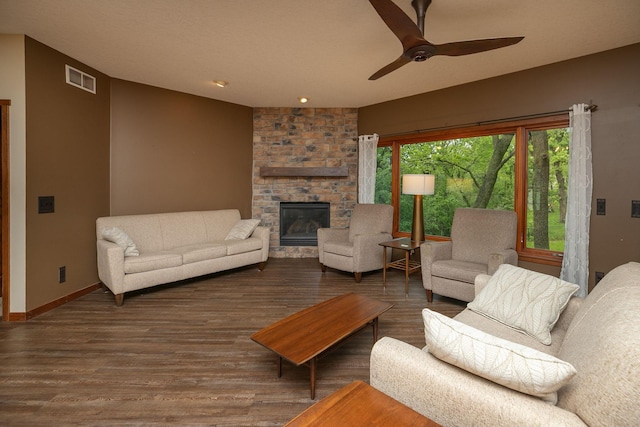 2373 Tee Time Rd SE, Rochester, MN 55904 - living room featuring ceiling fan, wood finished floors, a large fireplace, and baseboards