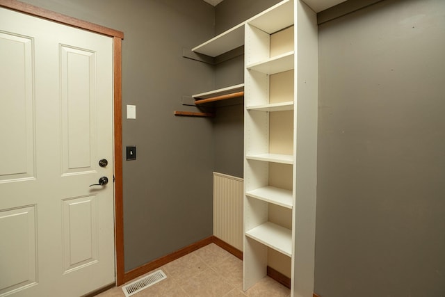 2373 Tee Time Rd SE, Rochester, MN 55904 - laundry room featuring baseboards