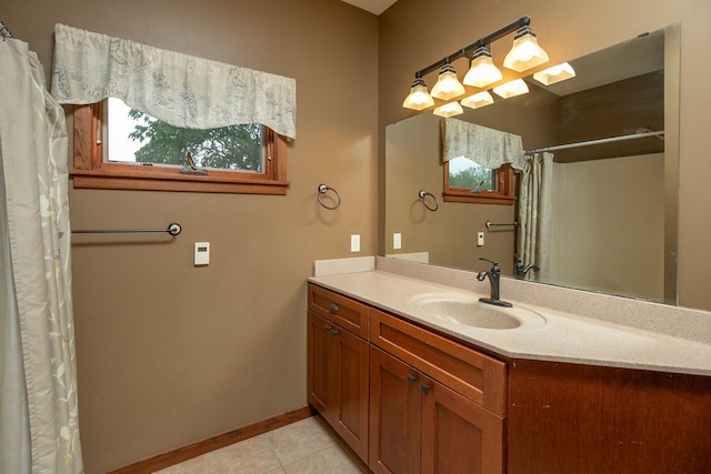 2373 Tee Time Rd SE, Rochester, MN 55904 - bathroom featuring vanity, tile patterned floors, baseboards, and a shower with shower curtain