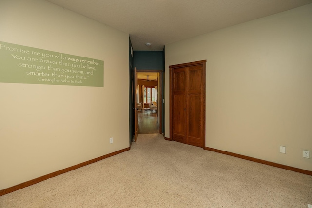 2373 Tee Time Rd SE, Rochester, MN 55904 - carpeted spare room with baseboards