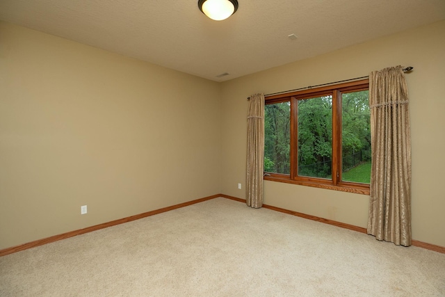 2373 Tee Time Rd SE, Rochester, MN 55904 - empty room with light carpet and baseboards