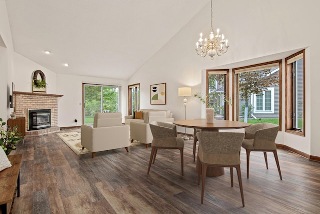 1263 Silverthorn Dr, Shoreview, MN 55126 - dining space with wood finished floors, a chandelier, a brick fireplace, baseboards, and high vaulted ceiling