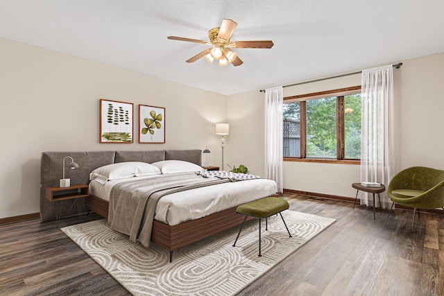 1263 Silverthorn Dr, Shoreview, MN 55126 - bedroom featuring wood finished floors, baseboards, and ceiling fan