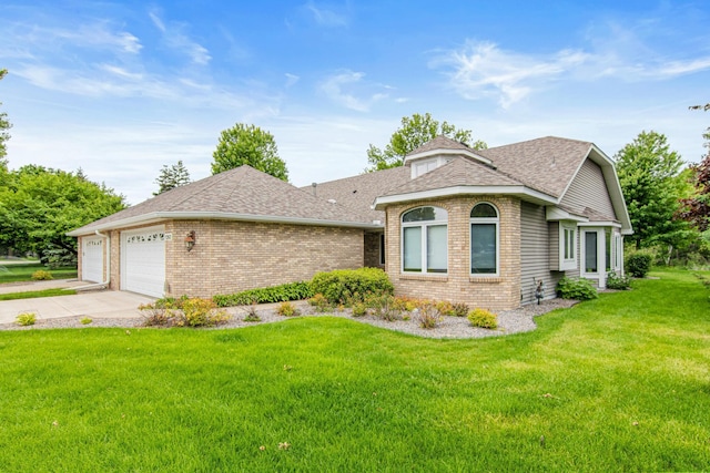1263 Silverthorn Dr, Shoreview, MN 55126 - view of front of property featuring brick siding, a front yard, an attached garage, roof with shingles, and concrete driveway