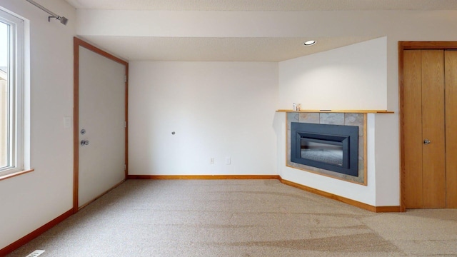 1904 Greenview Pl SW, Rochester, MN 55902 - unfurnished living room featuring carpet, a fireplace, recessed lighting, and baseboards