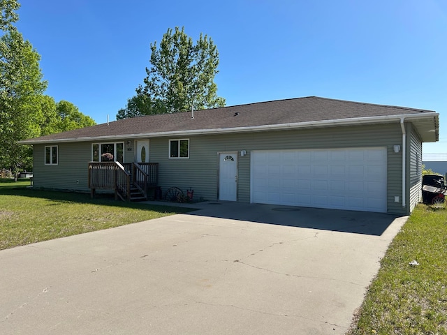 900 Pleasant Ave S, Park Rapids, MN 56470 - single story home featuring a garage, a front lawn, and driveway