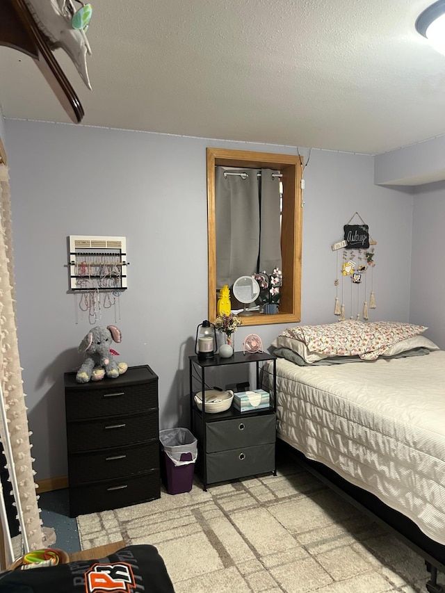 900 Pleasant Ave S, Park Rapids, MN 56470 - bedroom with a textured ceiling