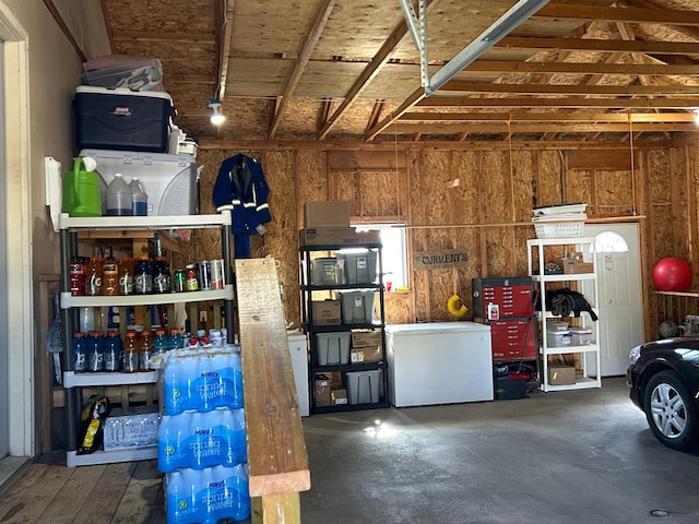 900 Pleasant Ave S, Park Rapids, MN 56470 - garage featuring white fridge