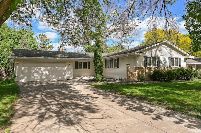 4020 Orleans Ln N, Plymouth, MN 55441 - ranch-style house with an attached garage, concrete driveway, a chimney, a front lawn, and brick siding