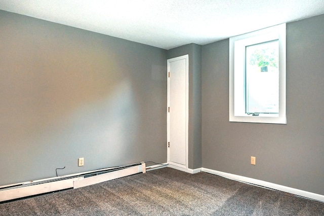 4020 Orleans Ln N, Plymouth, MN 55441 - empty room with baseboard heating, dark carpet, and baseboards