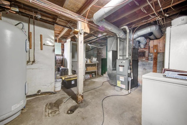 789 230th St, Galena Twp, MN 56176 - unfinished basement featuring water heater, refrigerator, and heating unit