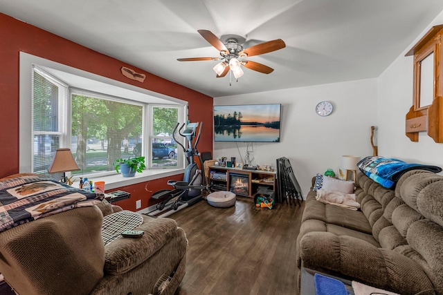 820 6th St, Montevideo, MN 56265 - living room featuring a ceiling fan and dark wood-type flooring