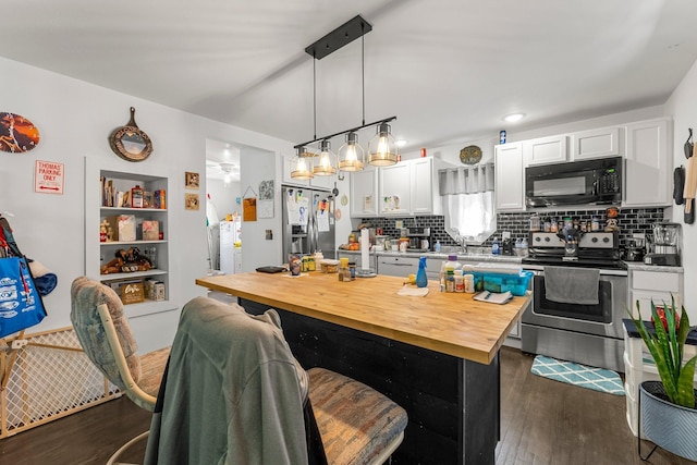 820 6th St, Montevideo, MN 56265 - kitchen with appliances with stainless steel finishes, dark wood-style floors, butcher block countertops, tasteful backsplash, and white cabinetry