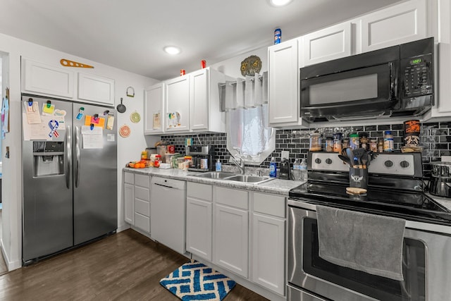 820 6th St, Montevideo, MN 56265 - kitchen with stainless steel appliances, a sink, tasteful backsplash, and light countertops