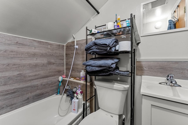 820 6th St, Montevideo, MN 56265 - full bathroom with vanity, bathtub / shower combination, vaulted ceiling, and toilet