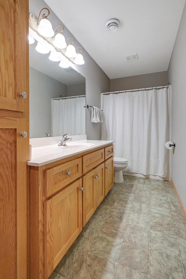 15285 Quinn St NW, Andover, MN 55304 - bathroom featuring vanity and toilet