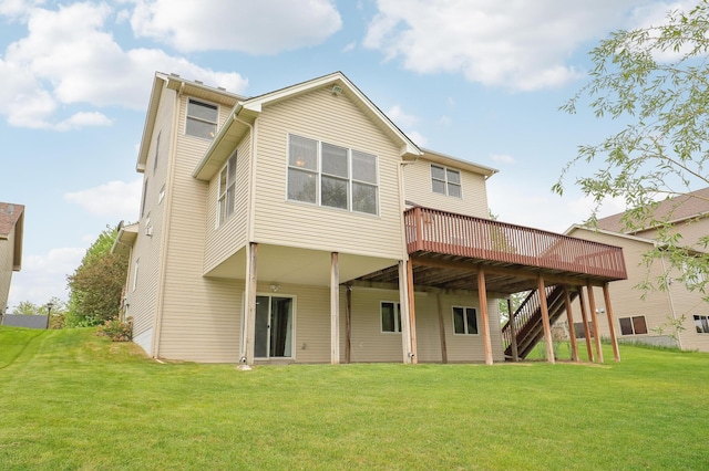 15285 Quinn St NW, Andover, MN 55304 - back of house with a deck, a lawn, and stairway