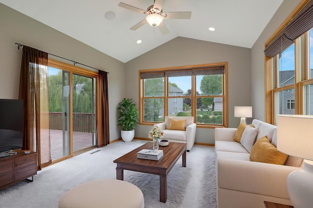 15285 Quinn St NW, Andover, MN 55304 - living room featuring lofted ceiling, ceiling fan, light carpet, baseboards, and recessed lighting