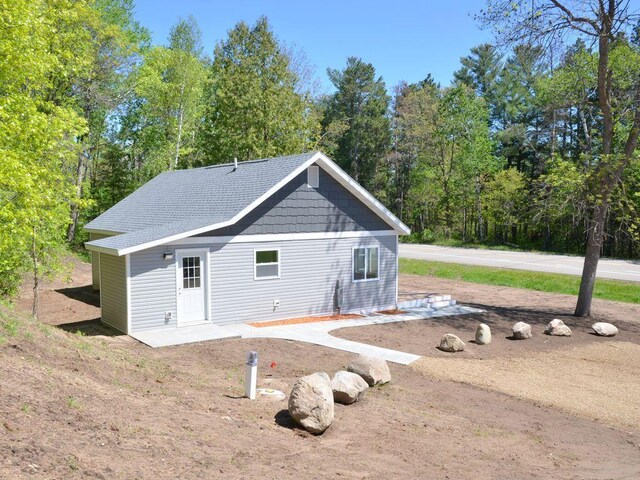 24061 US-71, Park Rapids, MN 56470 - back of house featuring view of wooded area