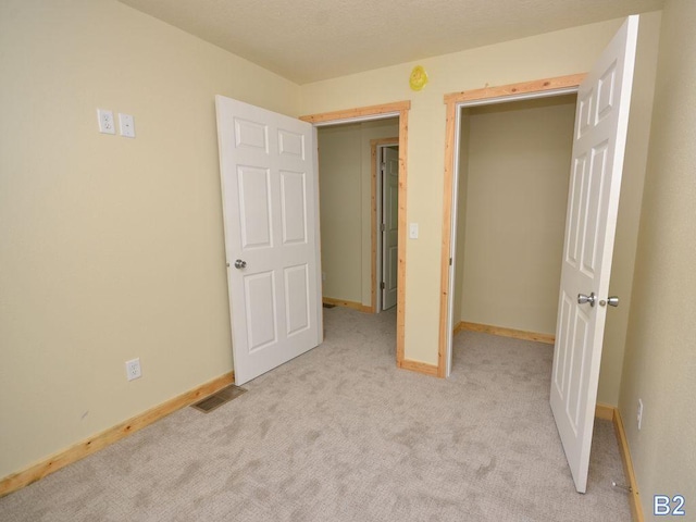 24061 US-71, Park Rapids, MN 56470 - unfurnished bedroom featuring light carpet and baseboards