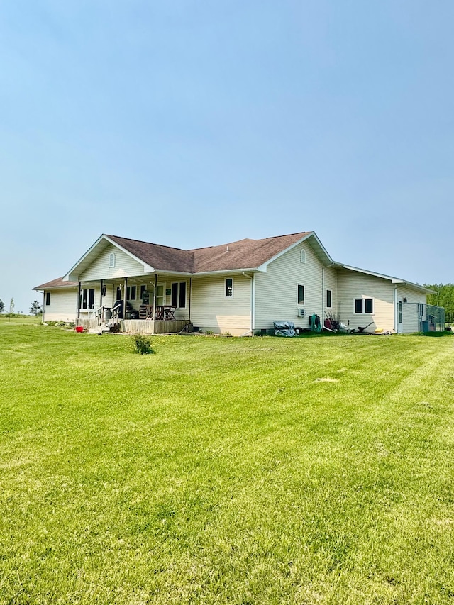 11777 State Highway 11 SE, Baudette, MN 56623 - rear view of property featuring a lawn and covered porch