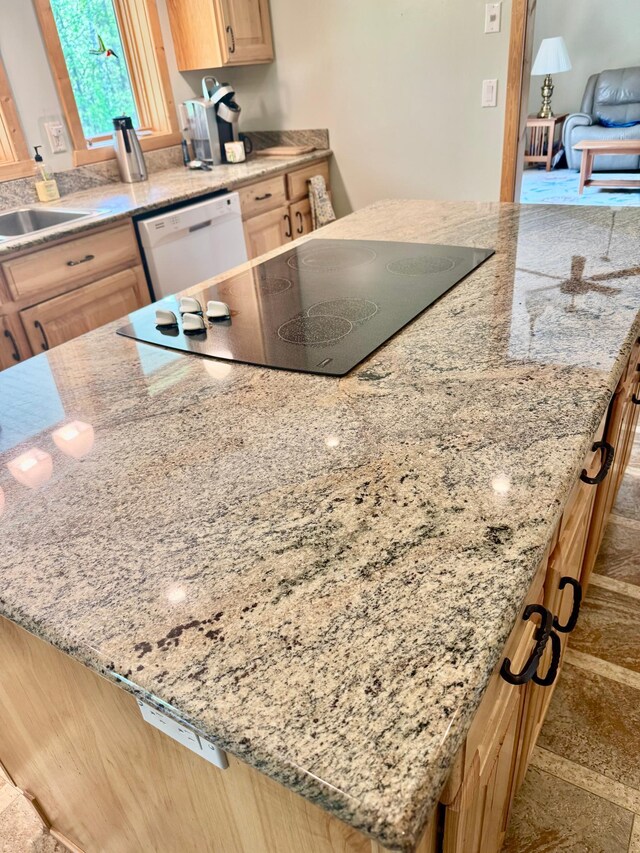 11777 State Highway 11 SE, Baudette, MN 56623 - kitchen with dishwasher, black electric cooktop, a sink, light brown cabinets, and a center island