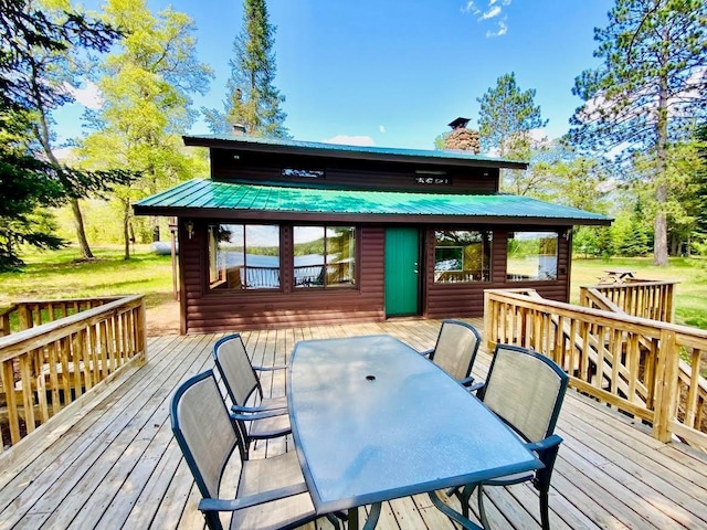 6974 Bankers Dr, Minong, WI 54859 - wooden deck featuring outdoor dining space