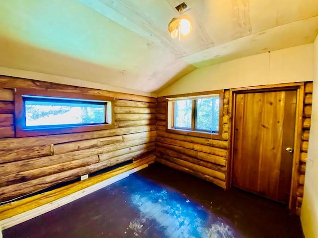 6974 Bankers Dr, Minong, WI 54859 - empty room featuring rustic walls and lofted ceiling