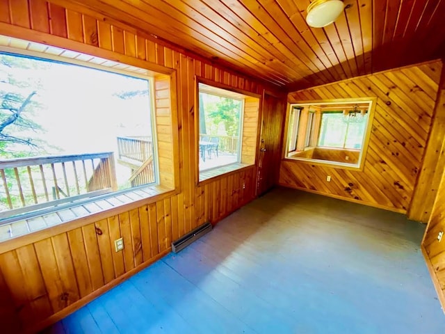 6974 Bankers Dr, Minong, WI 54859 - unfurnished sunroom featuring a baseboard radiator