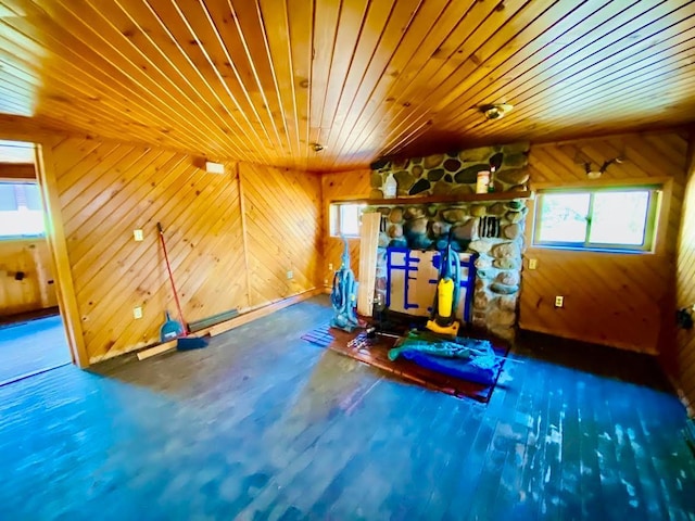 6974 Bankers Dr, Minong, WI 54859 - exercise area featuring wooden ceiling and wooden walls