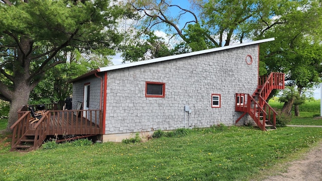 N10221 970th St, Grant Twp, WI 54730 - view of side of property with stairway, a deck, and a yard
