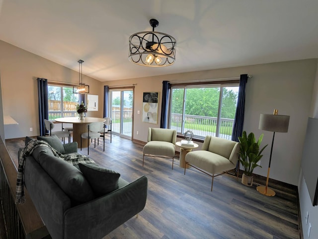 26884 709th St, Lake City, MN 55041 - living area featuring wood finished floors, baseboards, and vaulted ceiling