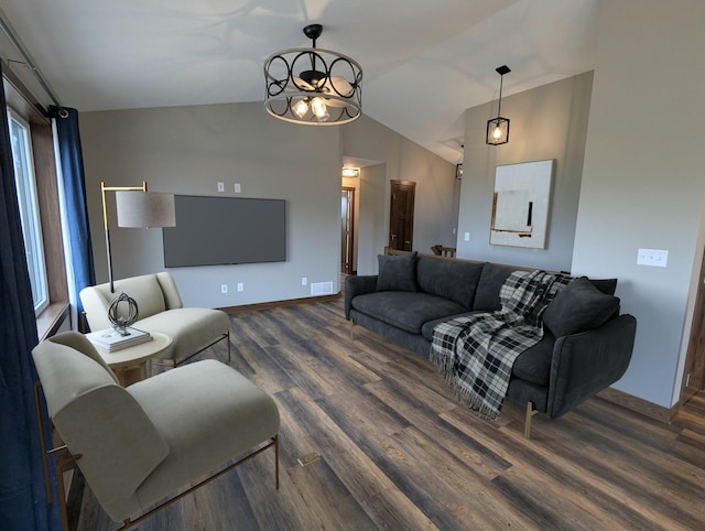 26884 709th St, Lake City, MN 55041 - living room featuring baseboards, wood finished floors, vaulted ceiling, and a chandelier