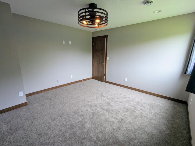 26884 709th St, Lake City, MN 55041 - empty room with baseboards, carpet, and a smoke detector
