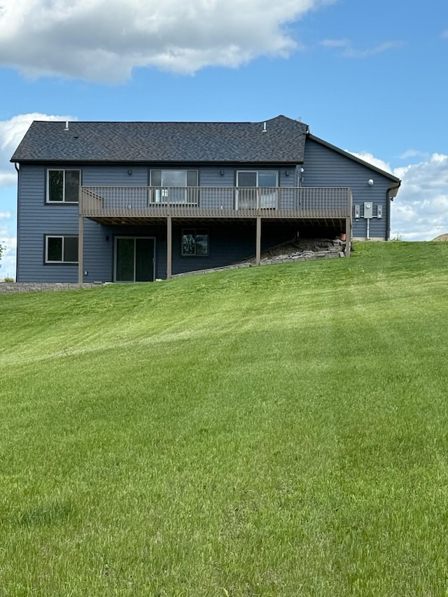 26884 709th St, Lake City, MN 55041 - rear view of property with a deck, a yard, and a shingled roof
