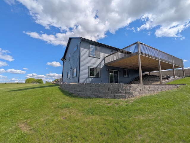 26884 709th St, Lake City, MN 55041 - rear view of property with a yard and a wooden deck