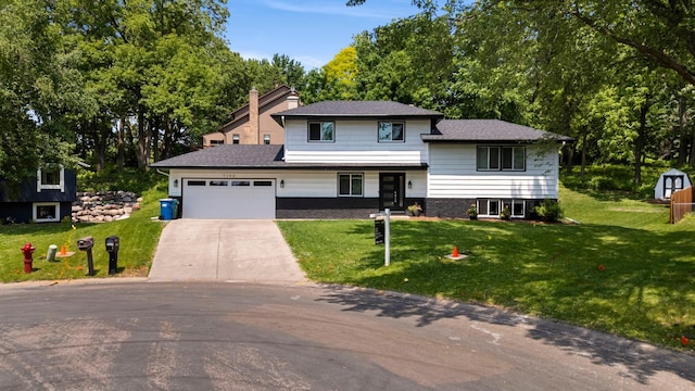 7190 Annapolis Cir, Maple Grove, MN 55311 - split level home featuring an attached garage, driveway, a front yard, a shingled roof, and view of scattered trees