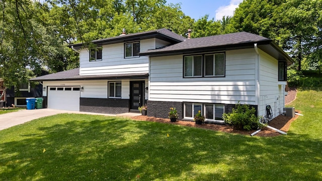 7190 Annapolis Cir, Maple Grove, MN 55311 - tri-level home featuring a front yard, concrete driveway, central AC, and a shingled roof