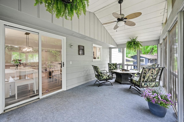7190 Annapolis Cir, Maple Grove, MN 55311 - sunroom featuring carpet, a ceiling fan, wooden walls, and lofted ceiling