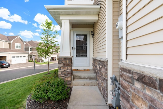 6980 Archer Trl, Inver Grove Heights, MN 55077 - view of exterior entry with a residential view and stone siding