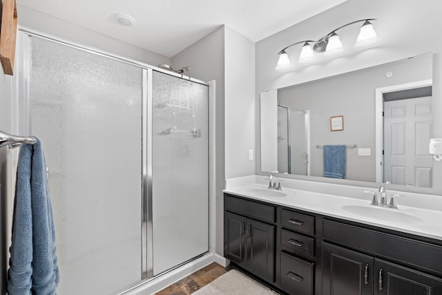 6980 Archer Trl, Inver Grove Heights, MN 55077 - bathroom featuring a stall shower and double vanity